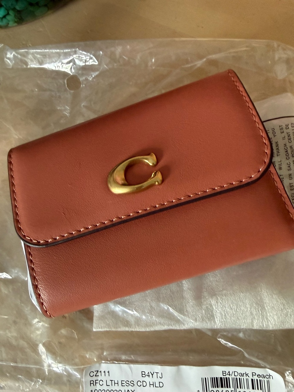 Coach Peach Leather Compact Wallet with Gold 'C' Accent